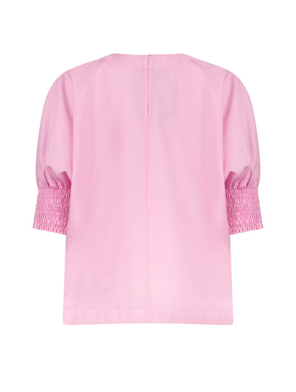 Locker sitzende Bluse mit elastischen Bündchen an den Ärmelenden. 