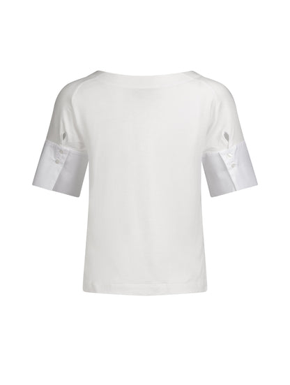 Jersey-T-Shirt mit Bateau-Ausschnitt, Seitenschlitzen und Bündchendetails aus weißer Baumwolle. Dieses Modell ist Teil unserer REBORN-Kollektion und steht für unsere "Zero-Waste-Politik".